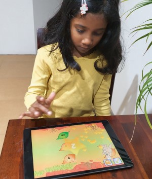 girl-with-ipad-300x353